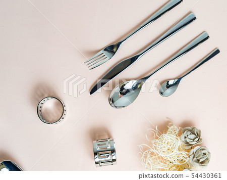 Round, square, oval white, blue, grey plate on pink, wooden, blue background, top view 54430361