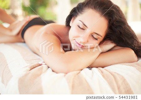 Spa. Woman getting spa lastone therapy outdoor. Spa. Woman getting spa lastone therapy outdoor. 54431981