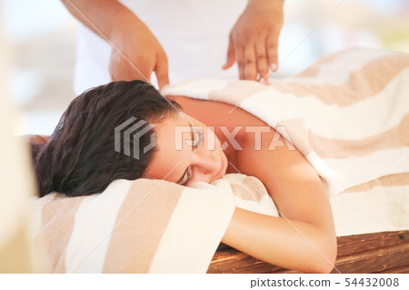 Spa. Woman getting spa lastone therapy outdoor. Spa. Woman getting spa lastone therapy outdoor. 54432008