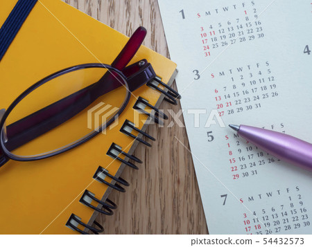 Business image · calendar · notebook · female 54432573