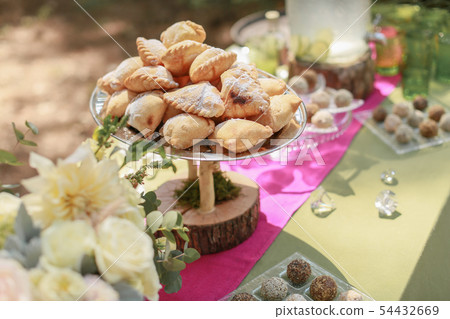 Festive wedding table, decorated with sweets and drinks 54432669