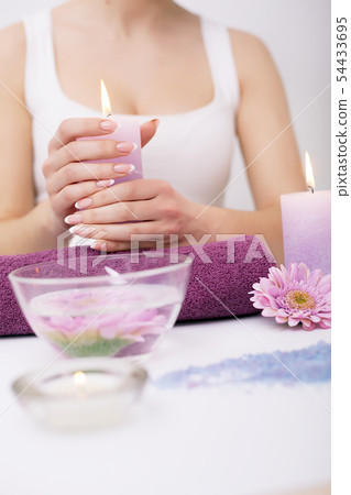 Nail Care And Manicure. Closeup Of Beautiful Female Hands Applying Transparent Nail Polish On 54433695