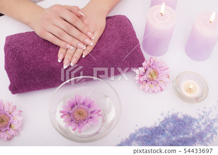Nail Salon. Closeup Of Beautician Hands Cleaning Female Client's Nails With Orange Wooden Stick 54433697