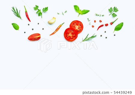 Various fresh vegetables and herbs on white 54439249
