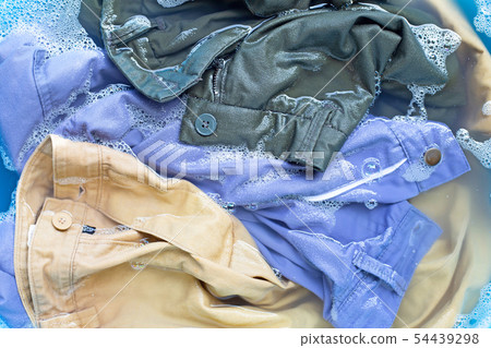 Trousers soak in powder detergent water 54439298