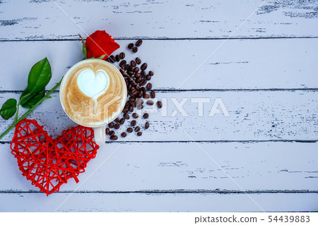 Red hearts and flowers on a white wood floor with 54439883