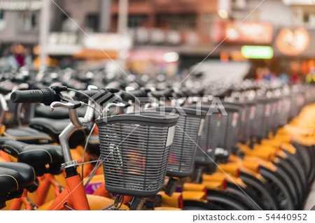 A lot of Bicycle rental service spot on road A lot of Bicycle rental service spot on road 54440952