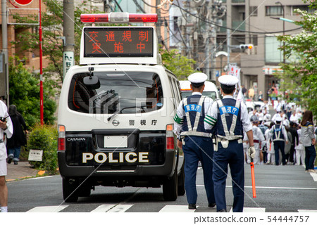 Traffic regulation for summer festivals by police vehicles 54444757