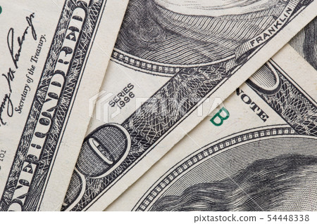 Texture of dollar bills. One hundred dollars. Close-up, macro. Texture of dollar bills. One hundred dollars. Close-up, macro. 54448338