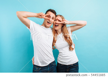 Young couple in love, man and woman, rejoicing and Young couple in love, man and woman, rejoicing and 54451885