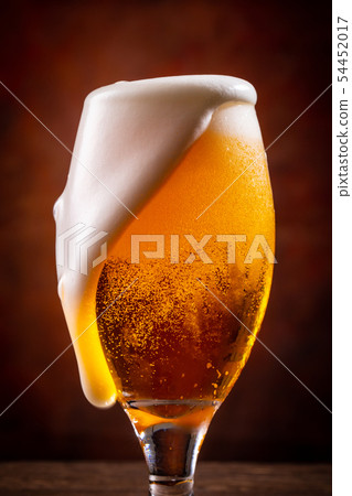 A toast with beer A toast with beer 54452017