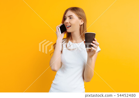 Portrait of a young beautiful woman , talking on 54452480