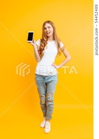Portrait of a beautiful girl , showing a blank 54452489