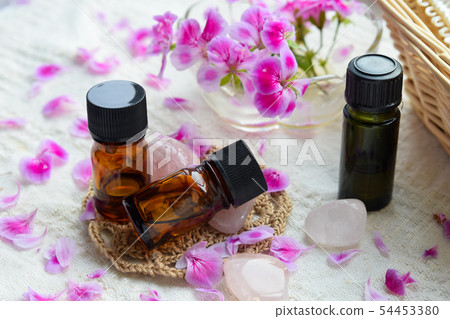 Geranium oil and petals Geranium oil and petals 54453380