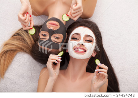 Spa. Group woman getting facial mask and gossip Spa. Group woman getting facial mask and gossip 54454748