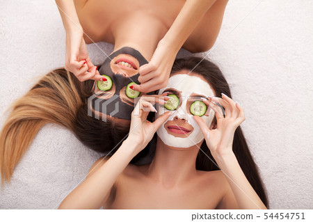 Spa. Process cosmetic mask of massage and facials in beauty salon Spa. Process cosmetic mask of massage and facials in beauty salon 54454751