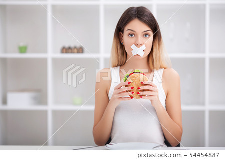 Unhealthy eating. Junk food concept. Girl don't eat junk food 54454887
