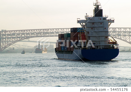 A cargo ship entering the port of Osaka 54455176
