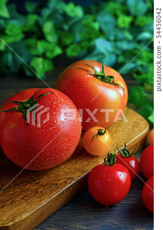Fresh tomato with waterdrop Fresh tomato with waterdrop 54456042