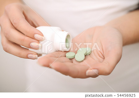 Acceptance of drugs. Self-treatment at home. Pills prescribed by your doctor. 54456925