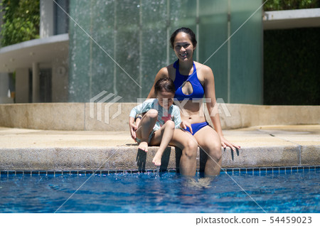 Asian chinese mother teaching child to swim Asian chinese mother teaching child to swim 54459023