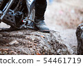 Trials motorcycle while competition in nature 54461719