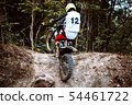 Trials motorcycle in competition 54461722