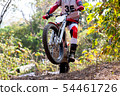 Trials motorcycle while competition in nature 54461726