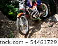 Trials motorcycle in competition 54461729