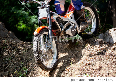 Trials motorcycle in competition 54461729