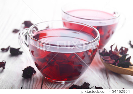 Closeup view at two tea cups and dry hibiscus 54462904