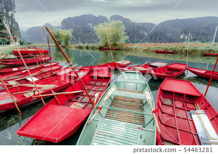 Vietnamese boats at river. Ninh Binh,. Vietnam Vietnamese boats at river. Ninh Binh,. Vietnam 54463281
