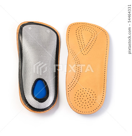 orthotics insoles on a white background orthotics insoles on a white background 54464331