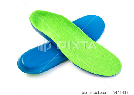 orthotics insoles on a white background orthotics insoles on a white background 54464333