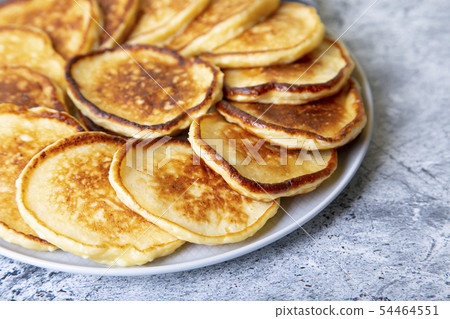 Cottage cheese pancakes (syrniki). 54464551