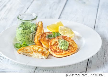 Portion of ricotta fritters Portion of ricotta fritters 54464928