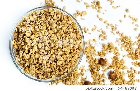 Various cereals and granola mix in a bowl Various cereals and granola mix in a bowl 54465098