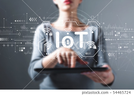 IoT theme with woman using a tablet 54465724
