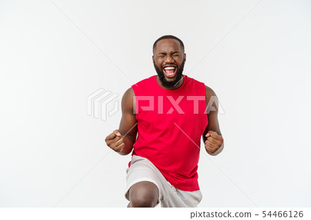 Young fitness african black man in sport wear cheering carefree and excited. Victory concept. Young fitness african black man in sport wear cheering carefree and excited. Victory concept. 54466126