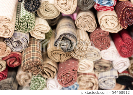 background of colorful fabric stacks background of colorful fabric stacks 54468912