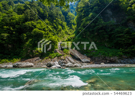 Landscape of the winter snow of the Kurobe Canyon in summer Landscape of the winter snow of the Kurobe Canyon in summer 54469623