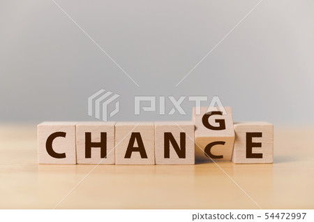 Wooden cube flip with word change to chance 54472997