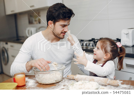 Family cook the dough for cookies 54475081