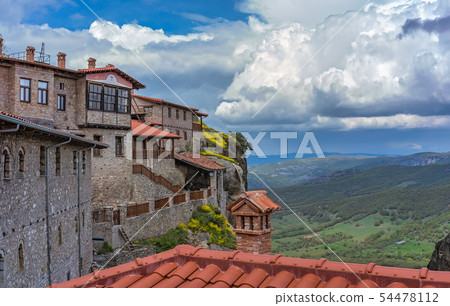 Red tiled rooftops of Great Meteoron Monastery 54478112