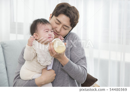 Parenting, childhood and family life concept photo 392 54480369