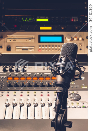 microphone on studio equipment background microphone on studio equipment background 54481599