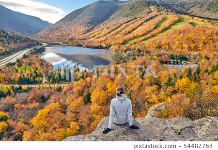 Woman hiking at Artist's Bluff in autumn Woman hiking at Artist's Bluff in autumn 54482763