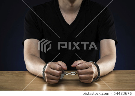 Male handcuffed 54483676
