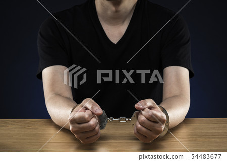 Male handcuffed Male handcuffed 54483677