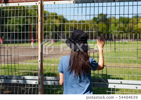 Middle women watching sports Middle women watching sports 54484639